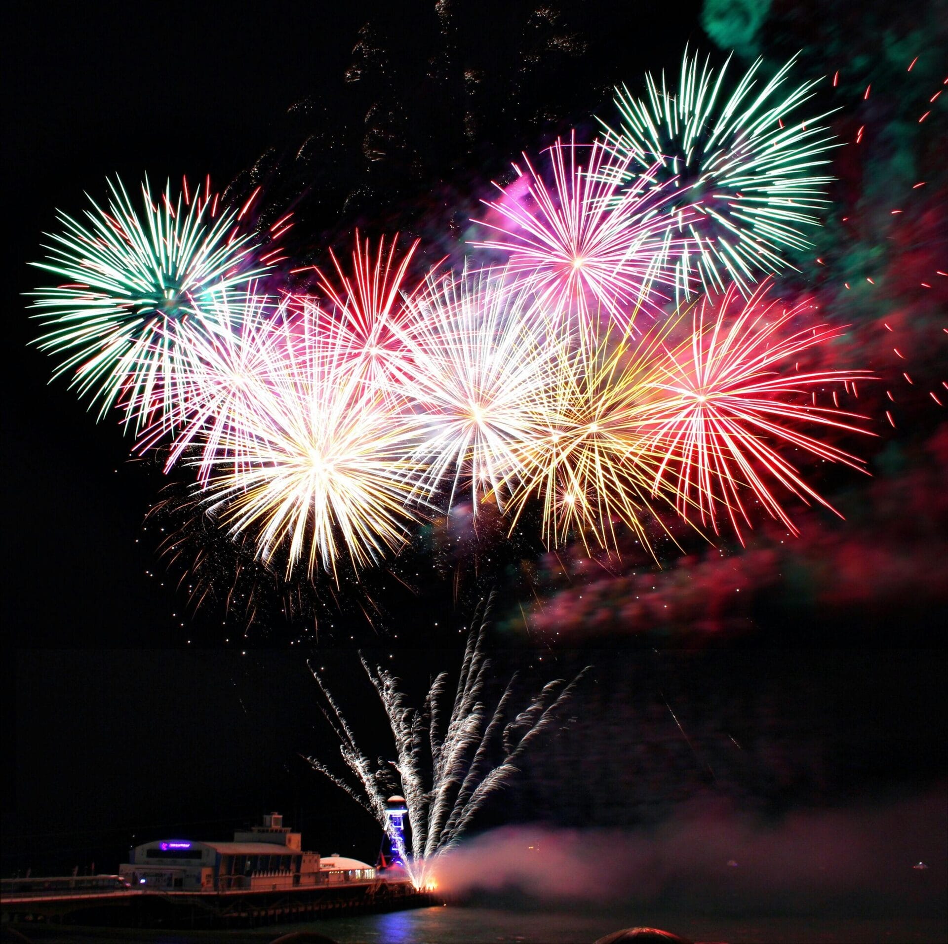 Multicolor fireworks set against a night sky