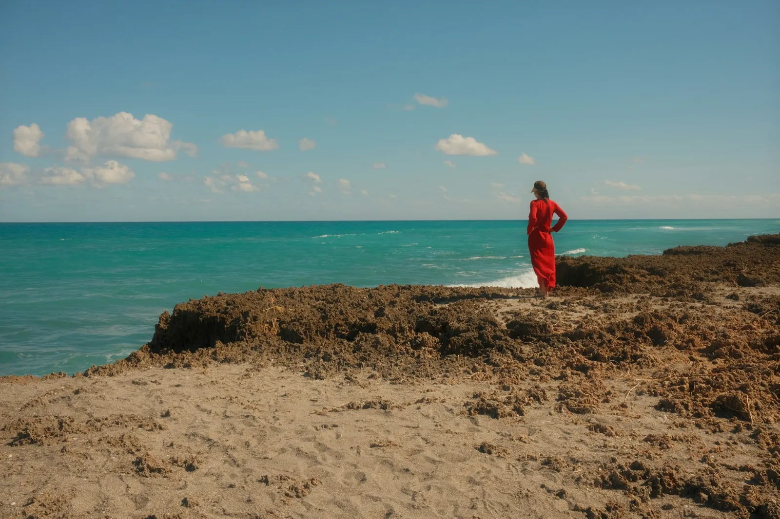 woman at blowing rocks in hobe sound
